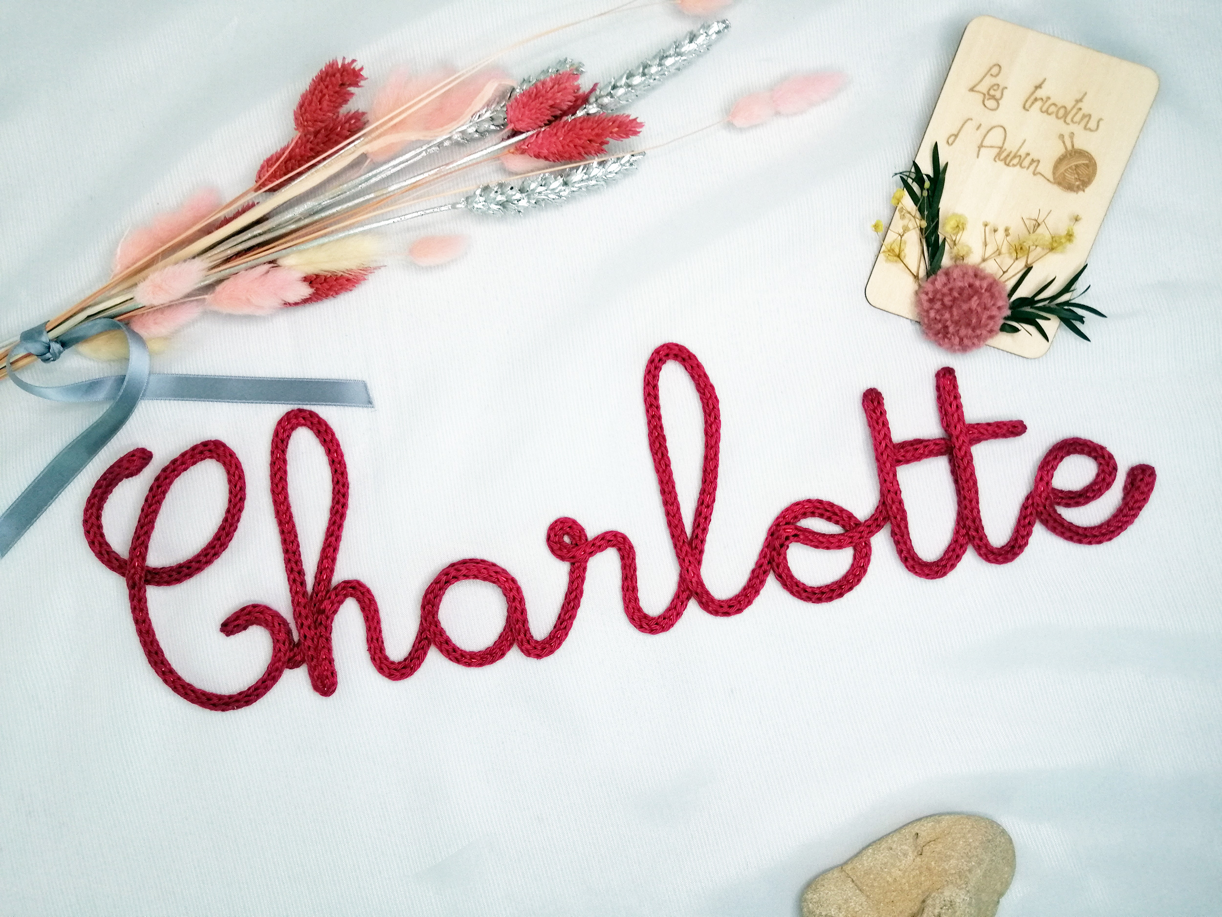 Prénom en tricotin Charlotte framboise